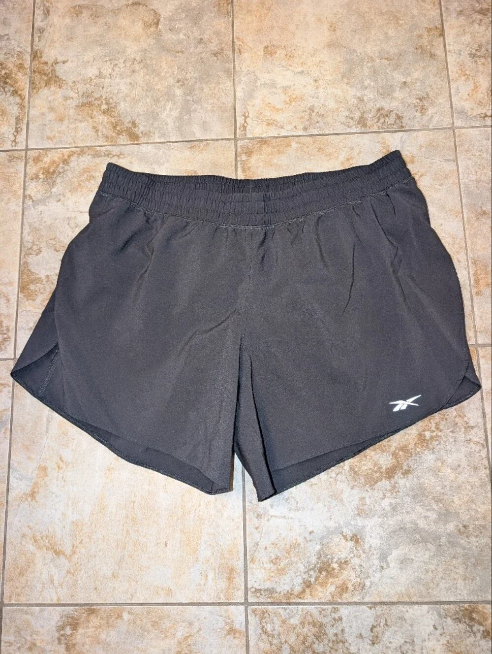 Reebok Black Workout Shorts with White Logo Accent